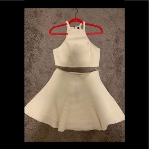 HONEY PUNCH CROP TOP AND SKIRT SET. NEW SIZE M